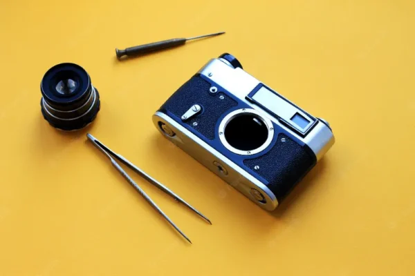 vintage camera lens tools tweezers screwdriver with yellow paper camera repair 95411 434